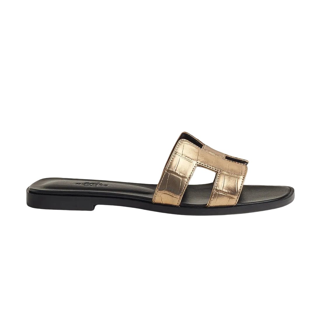 hermes-oran-sandal-in-alligator-skin-with-metallic-finish-dore-fonce-side_e56d57df-691f-4d3f-b5dc-dbb1835199d0.jpg