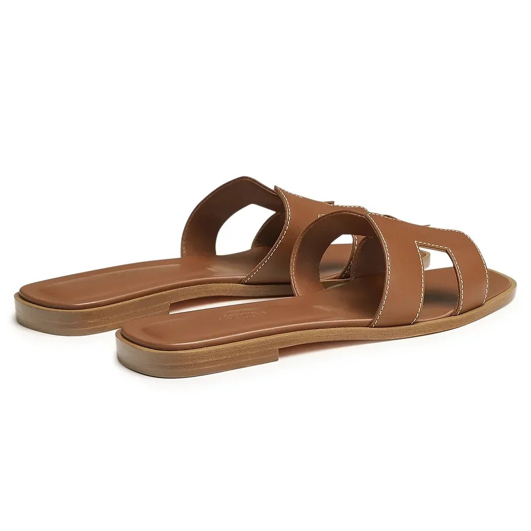 hermes-paris-oran-gold-sandal-heel_0314feff-9a13-4d84-a55b-0ceb923e0e2a.jpg